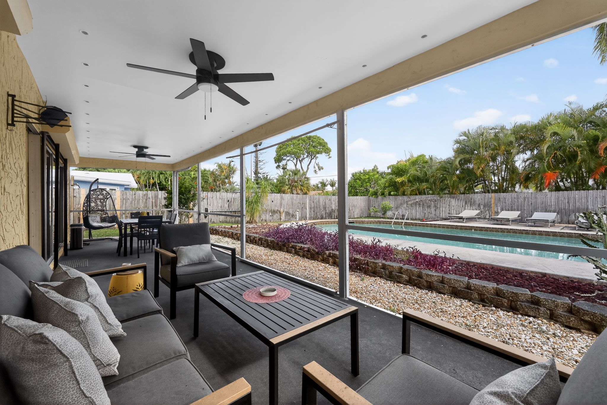 Pool and back exterior view 1 at 159 SE 26th Ave, Boynton Beach