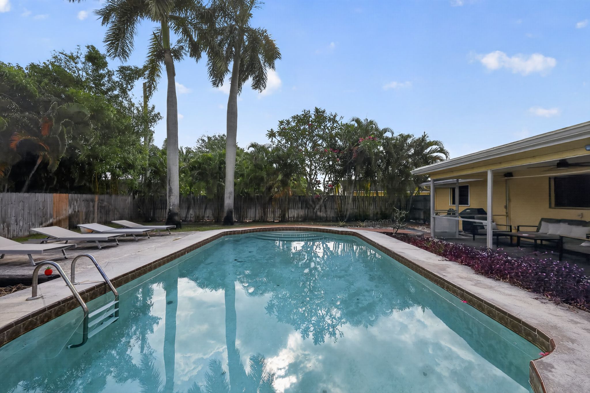 Pool and back exterior view 2 at 159 SE 26th Ave, Boynton Beach