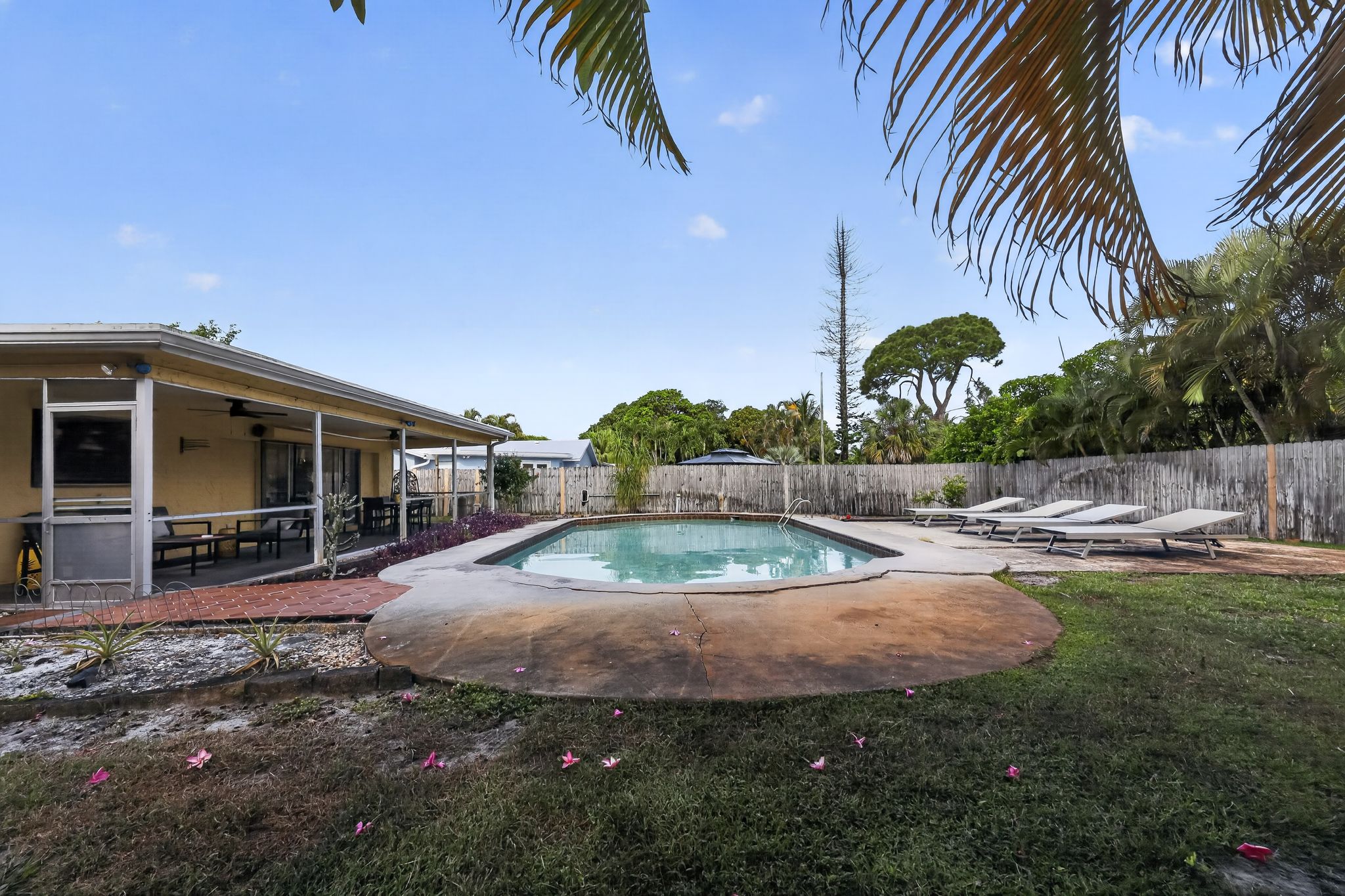 Pool and back exterior view 6 at 159 SE 26th Ave, Boynton Beach