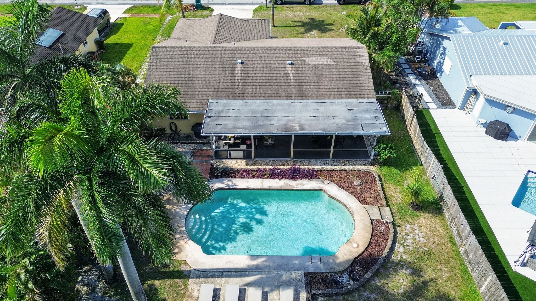 Aerial view of pool and back yard 7 at 159 SE 26th Ave, Boynton Beach